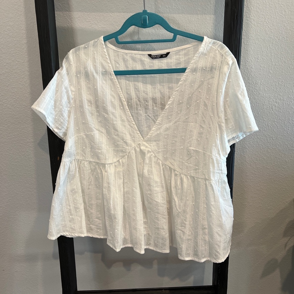 Short sleeved white blouse
